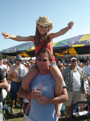 Anna and John jammin to Cowboy Mouth, Jazz Fest 06