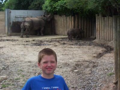 Connor posing with the rhinos